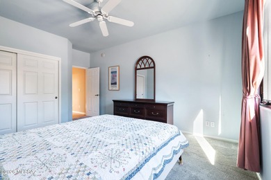 Perched atop a scenic hill in the prestigious Oro Valley Heights