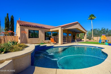 Perched atop a scenic hill in the prestigious Oro Valley Heights