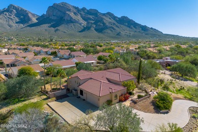 Perched atop a scenic hill in the prestigious Oro Valley Heights
