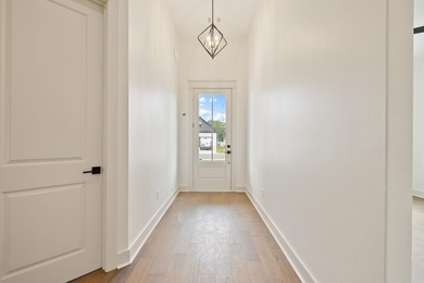 Welcome home to this stunning new construction white painted - photo 6