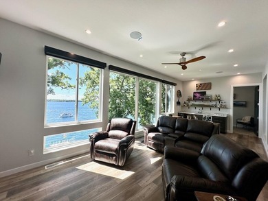 Sitting upon perhaps the highest perch of West Lake Okoboji, the - photo 47