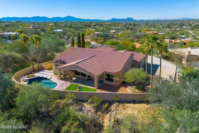 Perched atop a scenic hill in the prestigious Oro Valley Heights