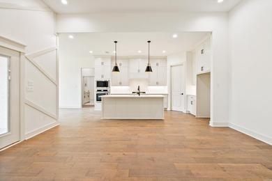 Welcome home to this stunning new construction white painted - photo 10