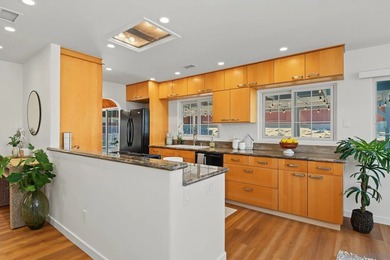 Priced at $1,150,000-$1,200,000, this 3-bedroom, 2-bath single - photo 7