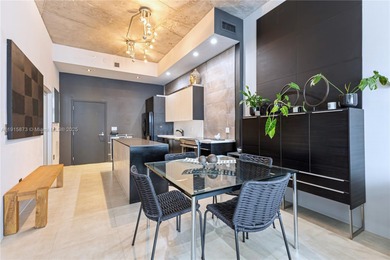 Oversized 1-bedroom loft-style condo (802 SF) at The Meridian