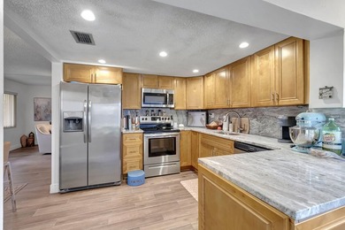 Rare 1st Floor Gem in Isle of Capri - Fully Updated! Experience - photo 12