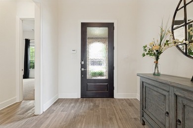 Lakeside luxury meets resort-style living in this exceptional - photo 2