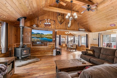 Discover the ultimate mountain lake lifestyle at this versatile - photo 2