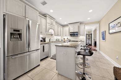 Welcome to 4701 Turnberry Lane 9B, located in the highly - photo 11