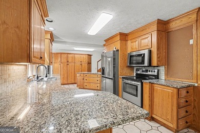 A private lake retreat priced below appraised value. Discover - photo 11