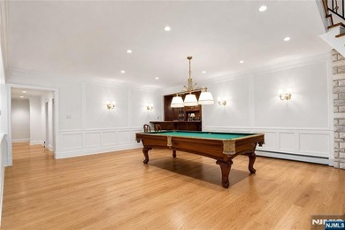 Beautifully updated ranch set atop a private 1.6-acre lot at the - photo 11