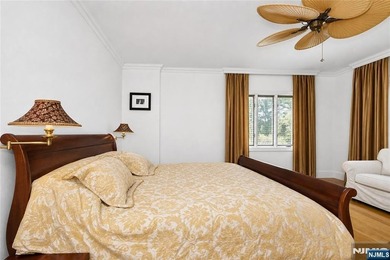 Beautifully updated ranch set atop a private 1.6-acre lot at the - photo 13