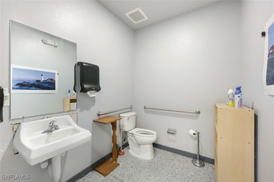 Built in 2019 this 8,550 +/- sf concrete block building sits on - photo 15