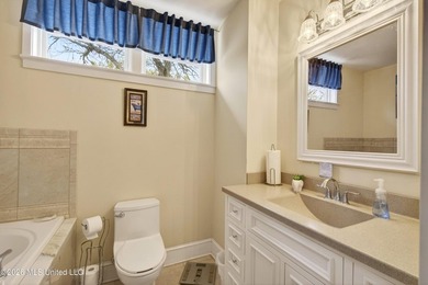 A charming and historical three bedroom, three bath cottage is - photo 28