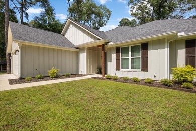 Almost new and brimming with farmhouse charm, this four bedroom - photo 3