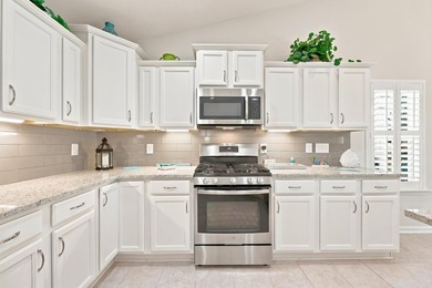 Better than new and loaded with upgrades, this beautifully - photo 7