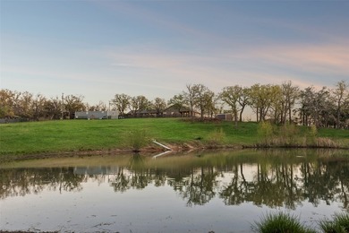 Tucked away on 5.56 picturesque, Ag-Exempt acres, this - photo 3