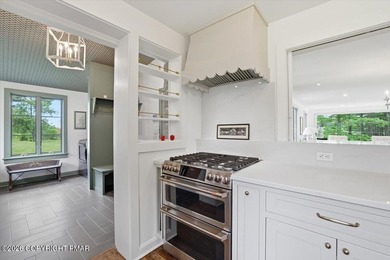 This elegant home is beautifully nestled on 1.5 acres high on - photo 21