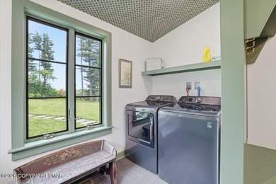 This elegant home is beautifully nestled on 1.5 acres high on - photo 41