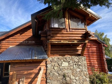 Exceptional handcrafted log home built with solid cypress logs - photo 2