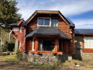 Exceptional handcrafted log home built with solid cypress logs - photo 4