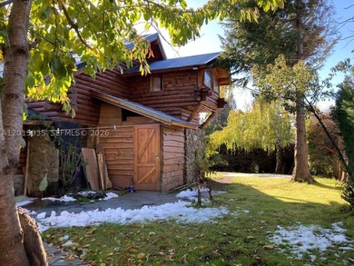 Exceptional handcrafted log home built with solid cypress logs - photo 6