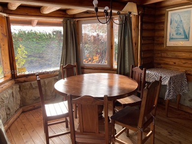 Exceptional handcrafted log home built with solid cypress logs - photo 9