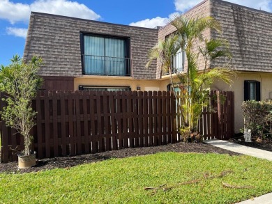 Lake Townhome/Townhouse For Sale in Palm Springs, Florida