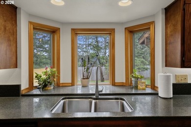 Nestled on 1.03 private acres, this spacious 3-level home offers - photo 11