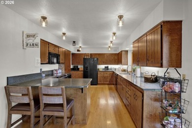 Nestled on 1.03 private acres, this spacious 3-level home offers - photo 12