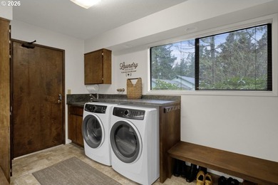 Nestled on 1.03 private acres, this spacious 3-level home offers - photo 17