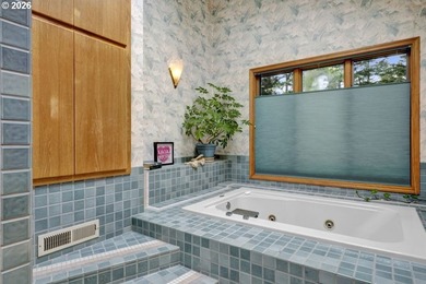 Nestled on 1.03 private acres, this spacious 3-level home offers - photo 22