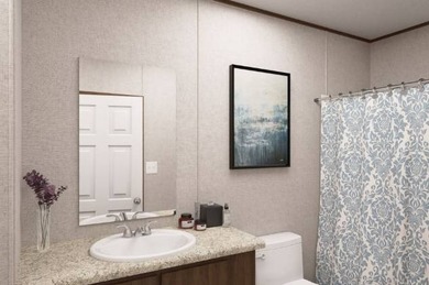 This BRAND NEW 2-bedroom 2-bathroom mobile home offers comfort - photo 13