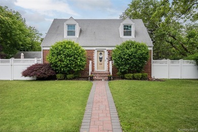 Charming Cape-style home in Merrick offering warmth, character - photo 1
