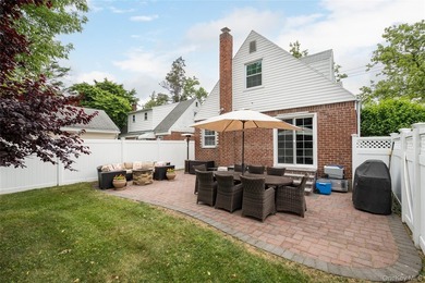 Charming Cape-style home in Merrick offering warmth, character - photo 4