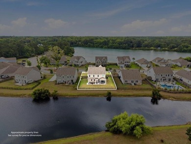 Situated on a premium pond lot, this stunning home is located - photo 4