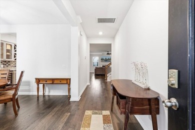 Situated on a premium pond lot, this stunning home is located - photo 6
