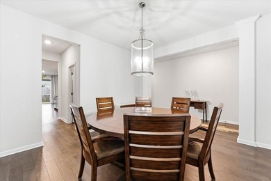 Situated on a premium pond lot, this stunning home is located - photo 8