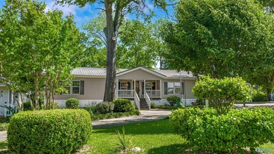 Tucked away near Weiss Lake, this home offers the kind of - photo 2