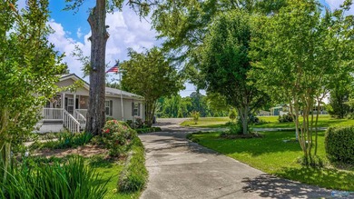 Tucked away near Weiss Lake, this home offers the kind of - photo 4
