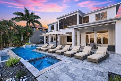 Step into refined coastal luxury at this exceptional waterfront - photo 3