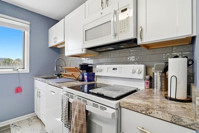 Welcome to 206 Double Eagle Dr. #A-2, a beautifully maintained - photo 10