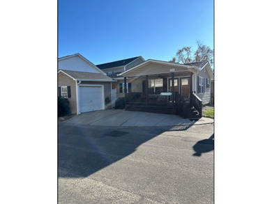 Bright & cheery 2BR/1BA beach cottage, 2024 ROOF & HVAC. Located - photo 1