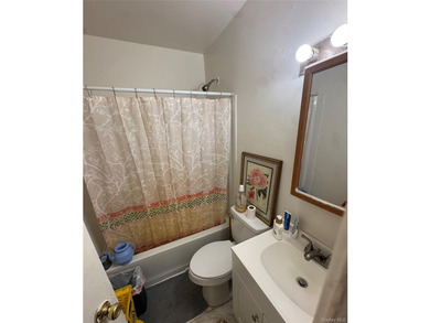 Discover your new beginning in the heart of Islip! This spacious - photo 3