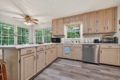 Charming cottage home nestled on nearly 7 private wooded acres - photo 13