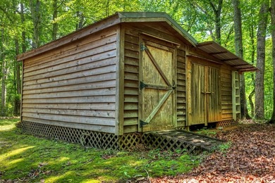 Charming cottage home nestled on nearly 7 private wooded acres - photo 23