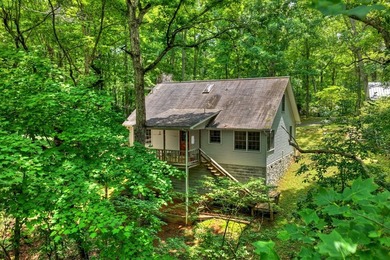 Charming cottage home nestled on nearly 7 private wooded acres - photo 32