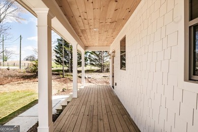 Tucked away on over an acre in the quiet charm of Murrayville - photo 3