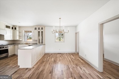 Tucked away on over an acre in the quiet charm of Murrayville - photo 5