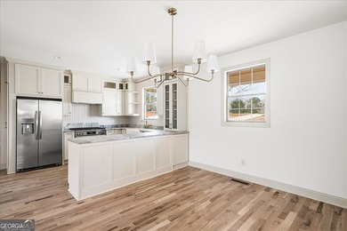 Tucked away on over an acre in the quiet charm of Murrayville - photo 6
